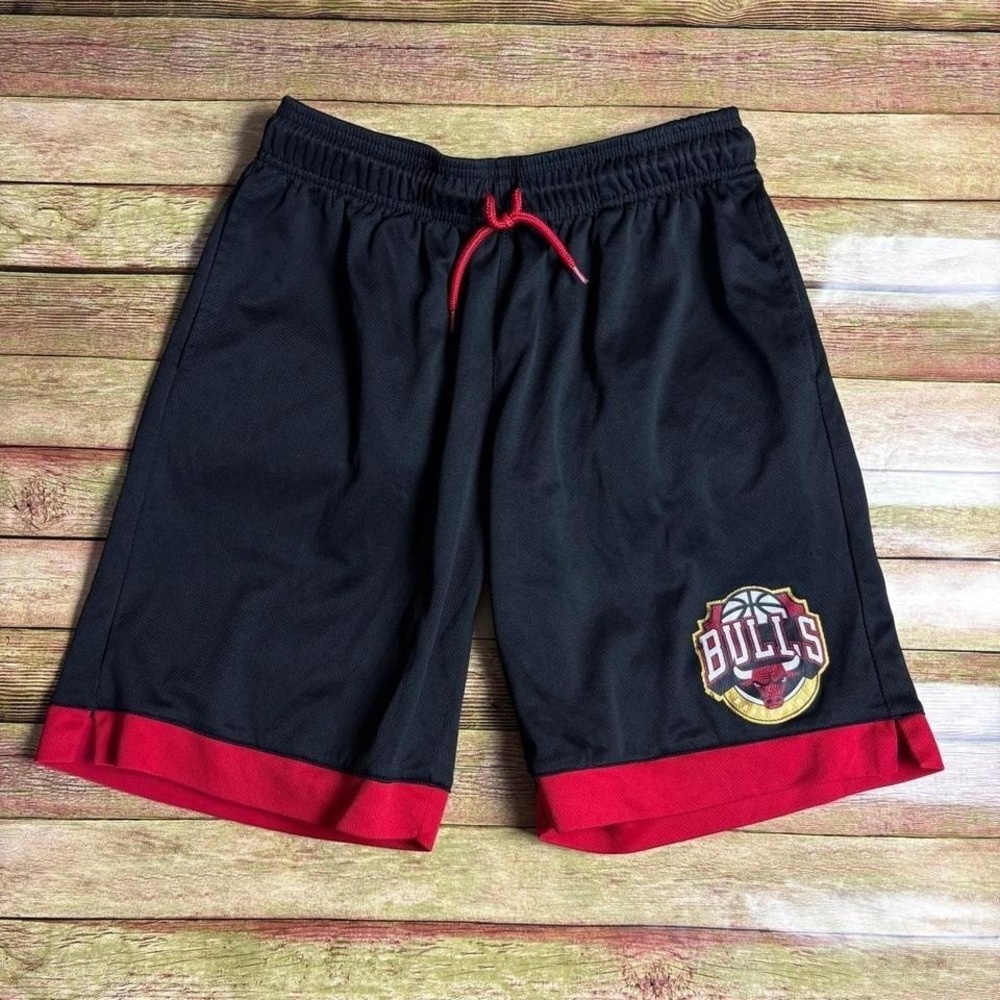 youth Chicago Bulls black basketball shorts with faded graphic, flaws in pic